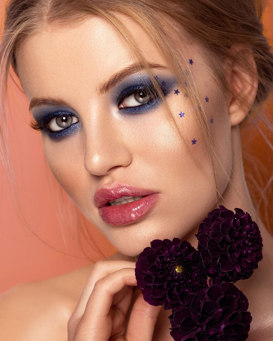 Beautiful White Lady With Blue Eyeshadows Flowers And Stars